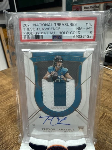 Trevor Lawrence 2021 National Treasures Prodigy RPA GOLD RC PATCH AUTO /10 PSA 8