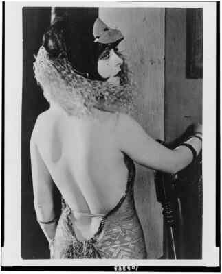 8'' x 10'' Photo 1920 Clara Bow, half-length portrait, standing, facing rig