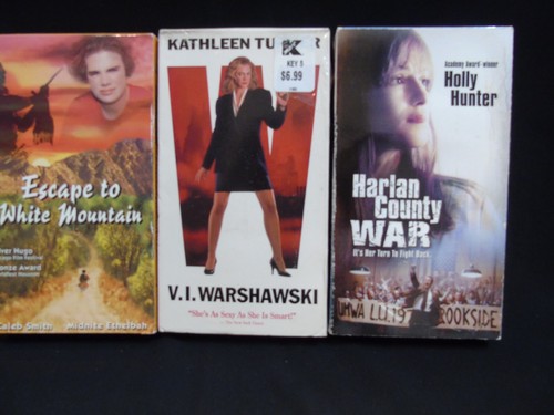 3 VHS Movies:  V.I. Warshawski, Escape to Witch Mountain, Harlan County War - Picture 1 of 7