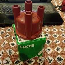 Genuine older but unused Lucas Distributor Cap DDB442 in box brown