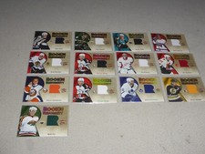 13 2005-2006 HOCKEY CARD LOT FLEER ROOKIE UNIFORMITY JERSEY RELIC VANEK HOWARD
