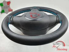 FUR GEO PRIZM 93-97 BLACK LEATHER STEERING WHEEL COVER, LIGHT BLUE 2 STIT