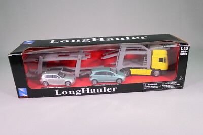 NEWRAY - Camion 4x2 MAN F2000 couleur jaune porte auto avec remorque et
