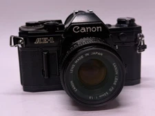 BLACK Canon AE-1  SLR Camera + Canon 50mm 1/1.8 Lens - Tested New Battery