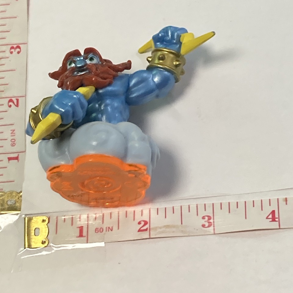 2012 Skylanders Zeus Figure Blue Holding Yellow Lightning Bolts