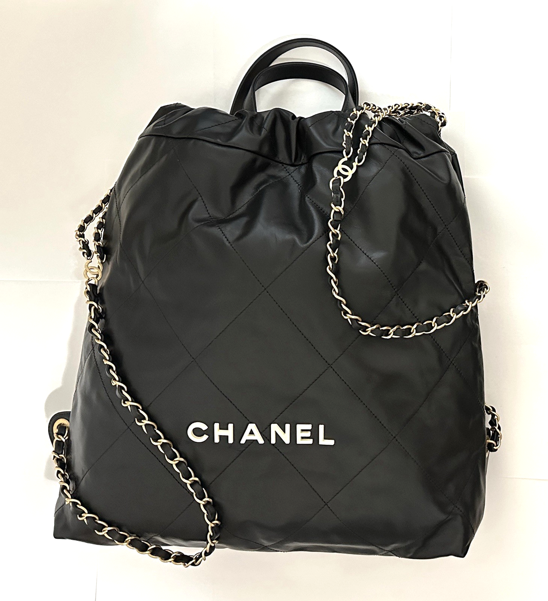 Chanel 22 Black Calfskin Backpack Rare White Logo & Gold-Tone