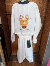 white anti-static coverall with a "High Tech" flame logo on the back.