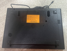 ATARI 2600 console with 25 games , 2 controllers and cords