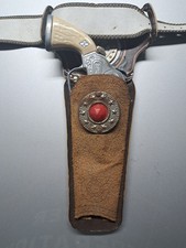 Vintage Holster and Hubley Cowboy gun that Works...