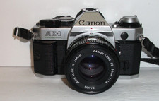 Canon AE-1 Program 35mm Film SLR Camera w/ FD 50mm f/1.8 Lens Silver Tested