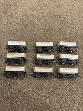 9 x Hornby R210 General Refractories   wagons.  Some with loads