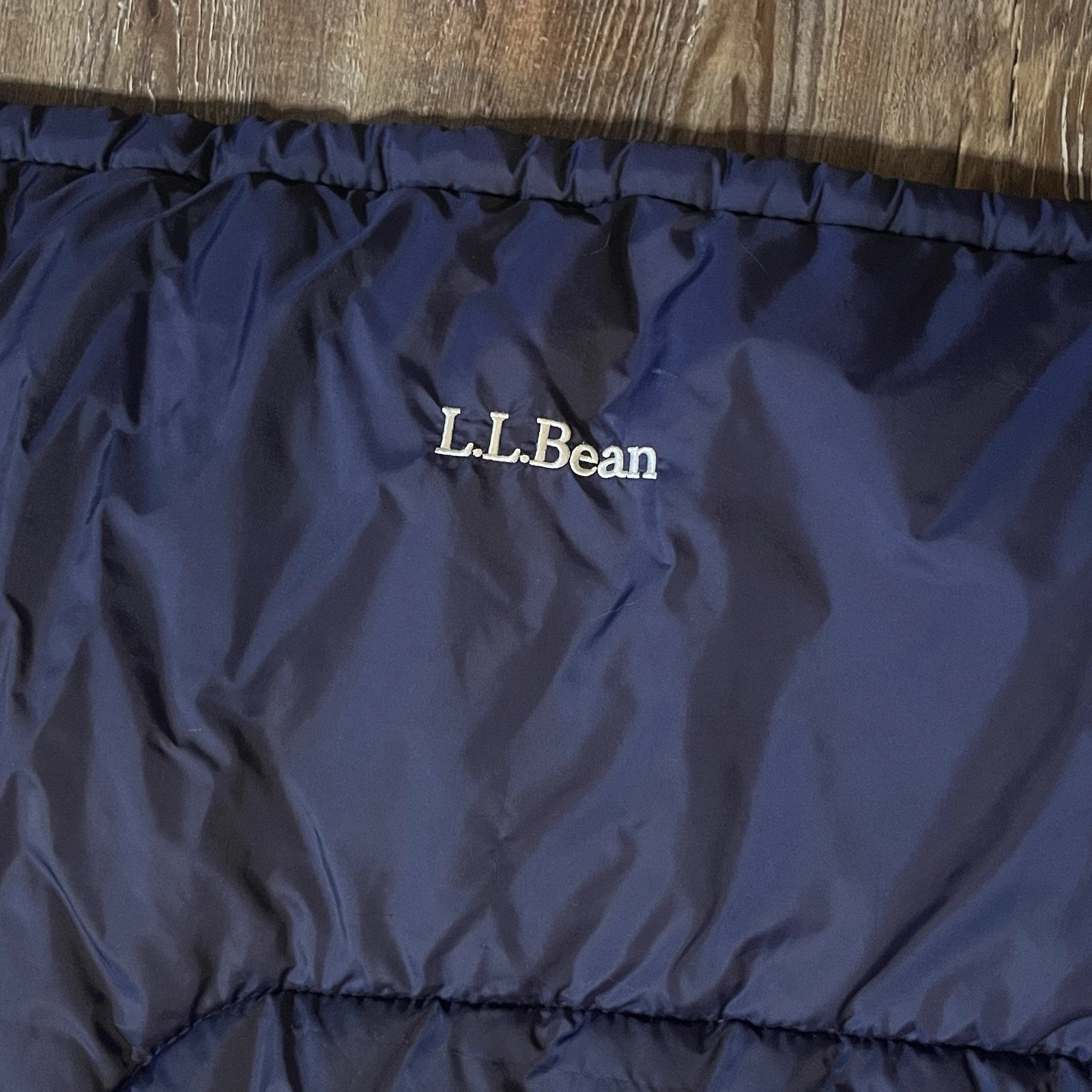 L.L. Bean Sleeping Bag. FINISHED SIZE 62in. X 27in. NET INSULATION WEIGHT 33OZ.