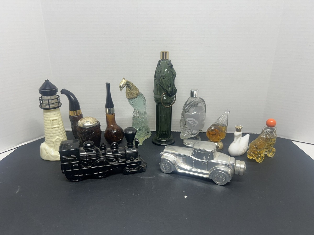 Vintage Lot of 11 AVON COLLECTIBLE PERFUME BOTTLES Cars Pipes, And Others ￼