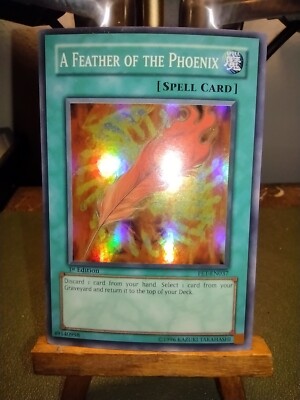 YuGiOh  A Feather Of The Phoenix  Rare 1st Edition FET-EN037 Super Rare...MINT!!