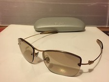 New DKNY 7255S 715 Sunglasses, Gold / Bronze with Lite Black Mirror Lens