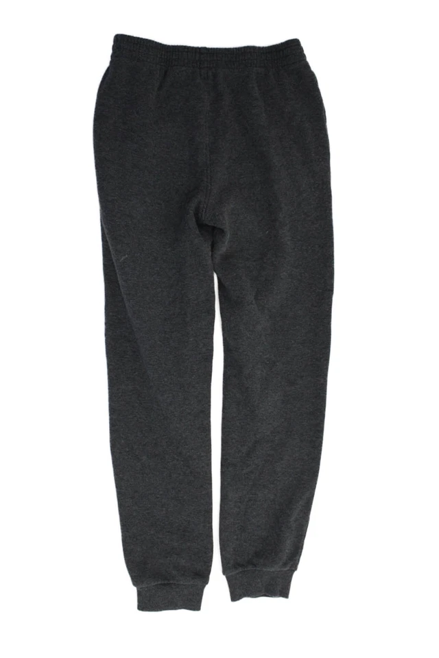 Pantalones de chándal Champion grises con logotipo atlético de pierna cónica para niños talla L Foto 2 de 4