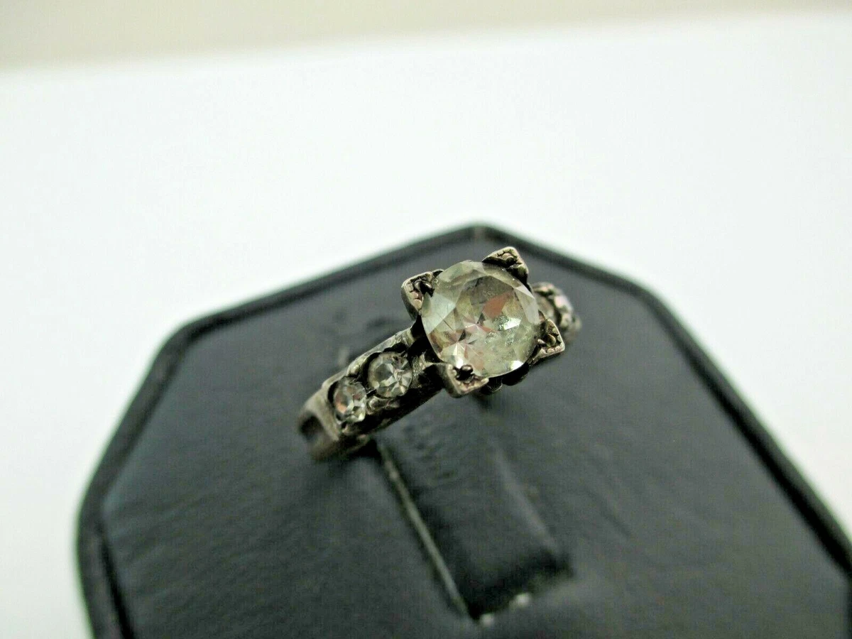 Ring with arrow through hotsell letter u