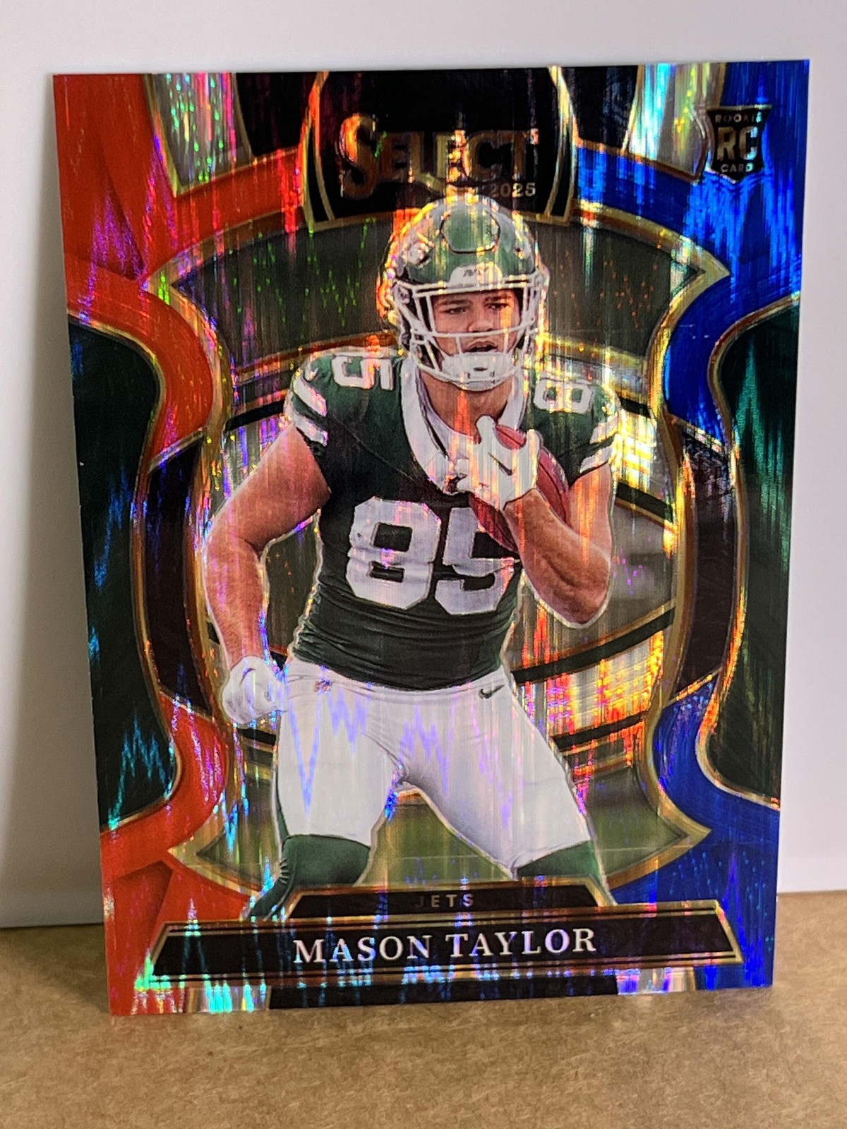 2025 Panini Select #76 Mason Taylor Red and Blue Prizm Shock
