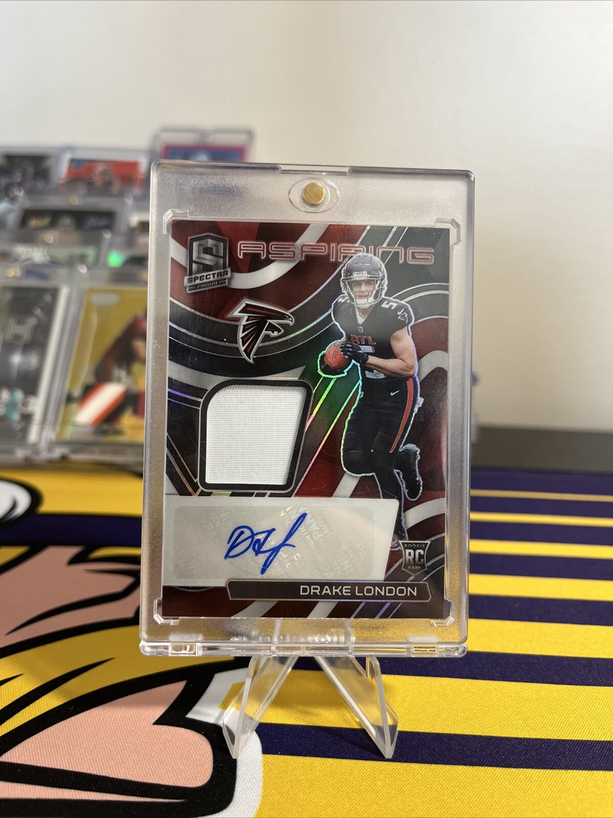 2022 Panini Spectra - Aspiring Patch Autographs Drake London #APA-DLO /99