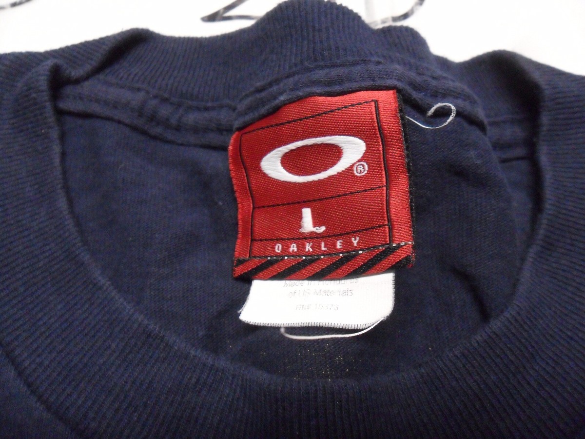 【vintage】oakley オークリー メタルロゴ ロングスリーブ Men's Vintage OAKLEY Surf Logo Gray Long Sleeve T-shirt Size