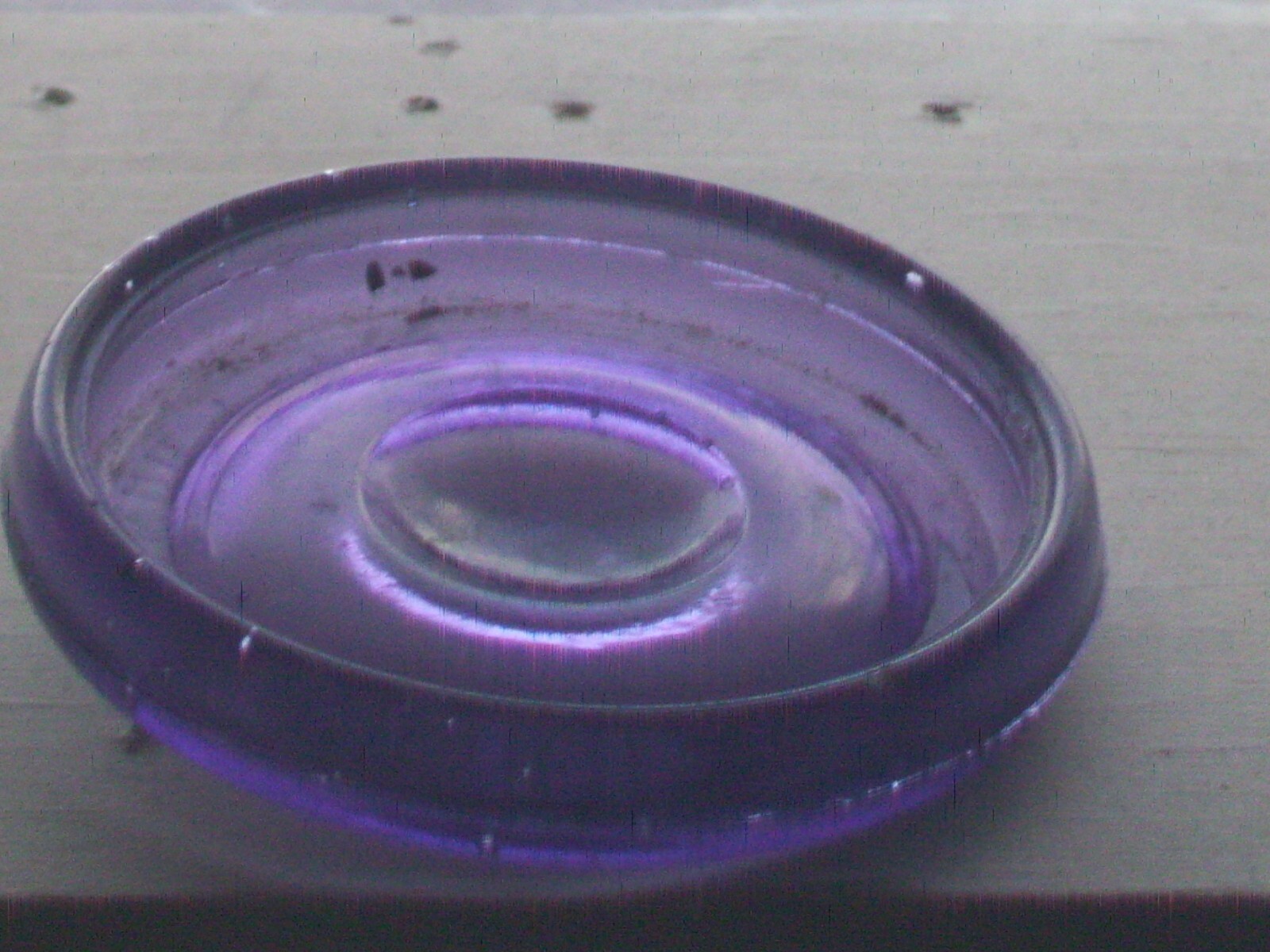 Dark purple J, Hungerford Smith co. Rochester, N. Y. glass top canning jar lid