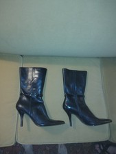 Nine West High Heel Boots in 12 Medium. No wear on soles.