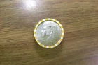 Kennedy half dollar roll with a 40% silver 1969-D  half on end in vV- good cond.