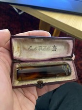 tres jolie ancien fume cigarette en bakelite ambre