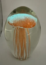 Art Glass Orange Jellyfish Paperweight Slight Glow in the Dark, Bubbles