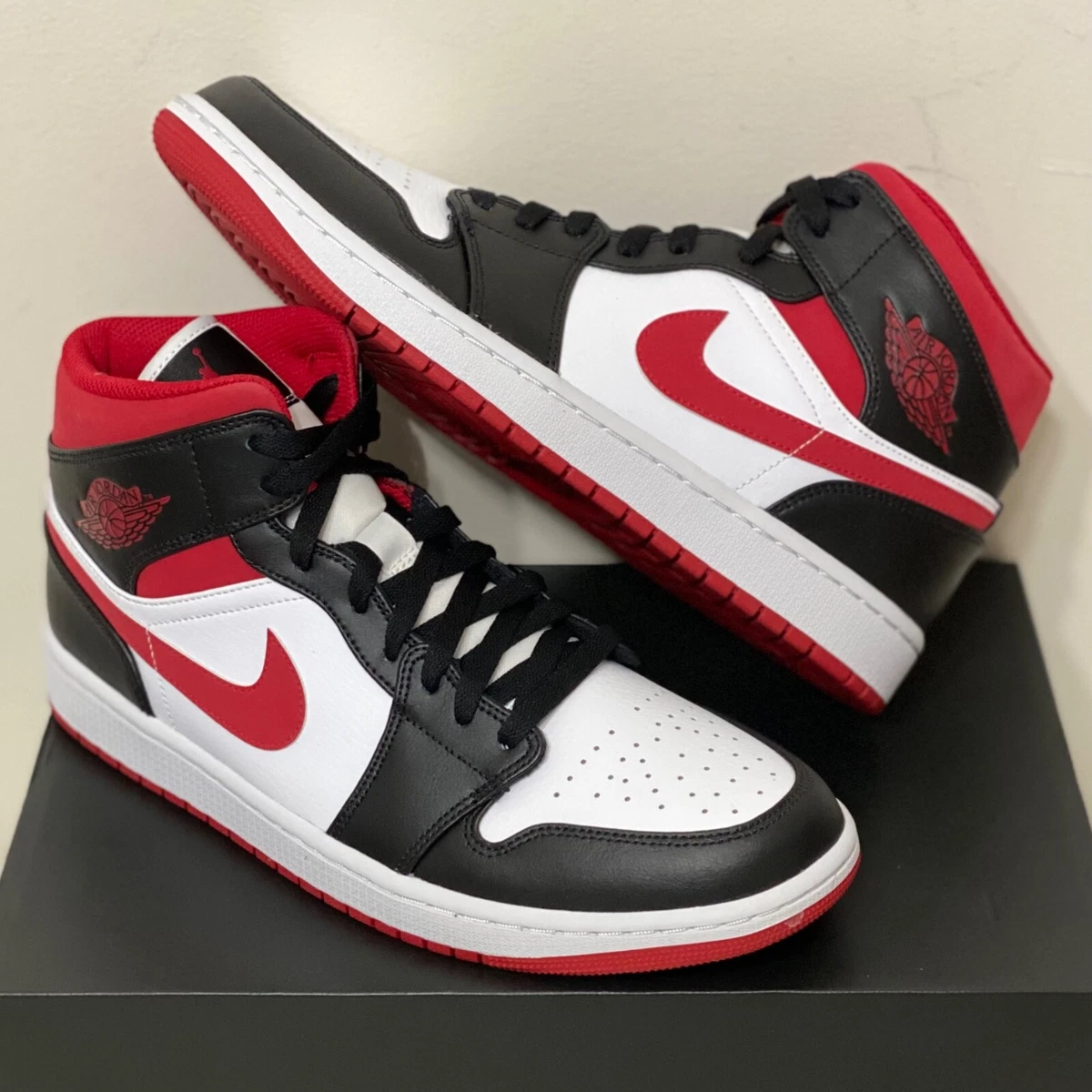 Jordan Air Jordan 1 Mid Sneaker in Black, Gym Red, & White