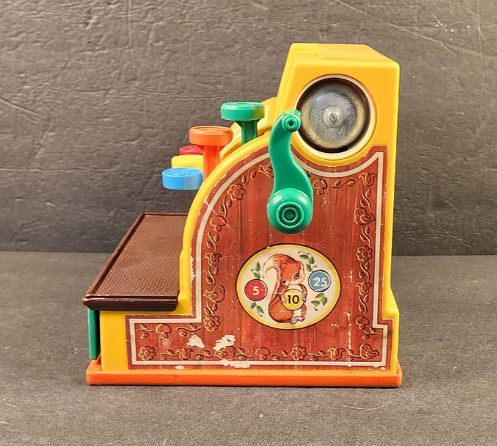 как выглядит VINTAGE 1974 FISHER PRICE TOY CASH REGISTER ONLY TESTED AND WORKING NO COINS фото