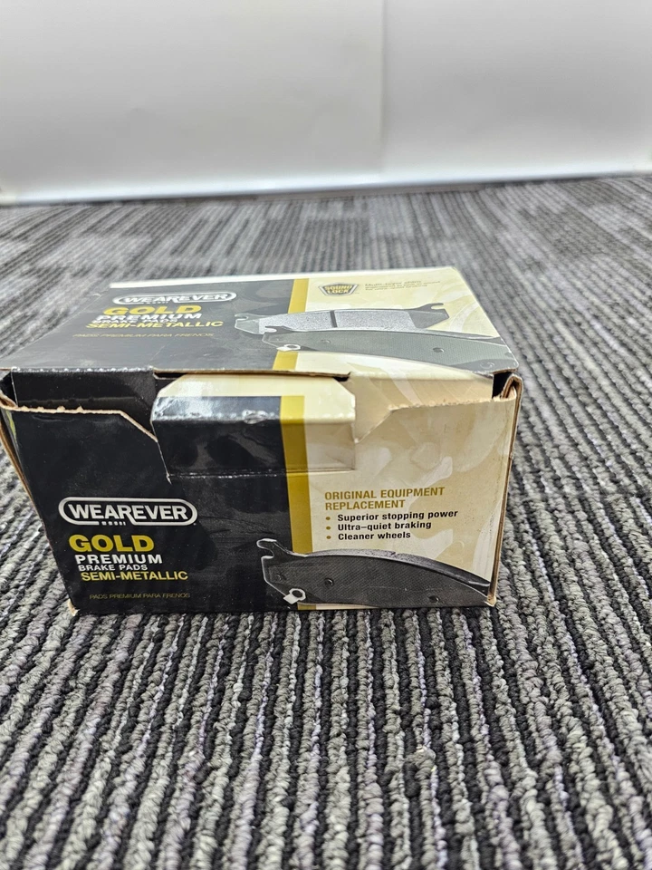 Pastilla de freno semimetálica premium dorada GMKD567 para Mitsubishi Montero 1992-2000 Foto 2 de 4