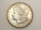 1885-O $1 MORGAN SILVER ONE DOLLAR CH/GEM BU