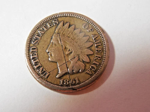 1861 Indian Head Penny in about VF condition. Beautiful but for the scratches.