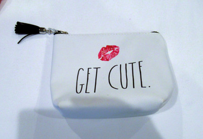 Get Cute white cosmetic bag by Rae Dunn