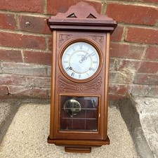 Highland wall clock  Wooden Pendulum Wall Clock With Glass Panelling