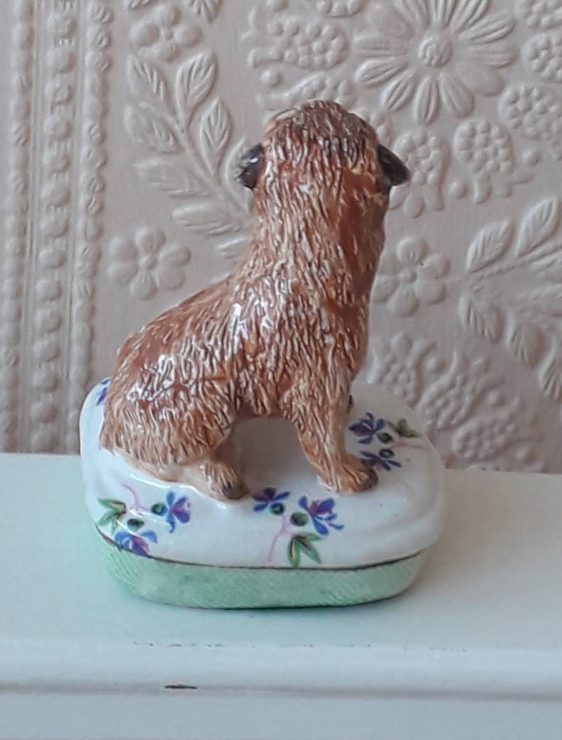 BASIL MATTHEWS POTTERY BORDER TERRIER SEATED ON A CUSHION DOG MODEL ORNAMENT