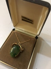 Oval Genuine Jade Necklace With A Gold Filled Chain