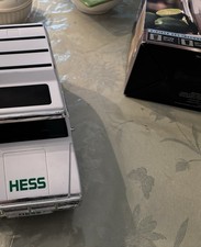 2004 Green Hess SUV With Two Motorcycles