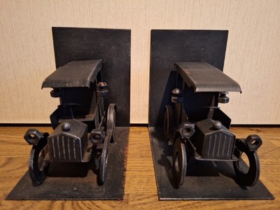Gebe 2 tolle alte Vintage Oldtimer Buchstützen aus Metall, je ca. 500 Gramm!