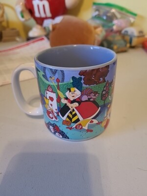 Disney Coffee Mug Alice in Wonderland with scenes and multiple characters