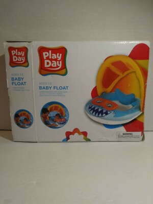 Super cute Baby shark float with sun canopy!!   New open box.  Ages 1 to 2