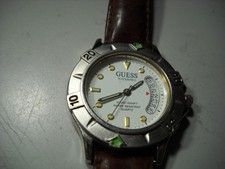 854L Guess 1996 Waterpro 300M rotating bezel white dial cresent day date work