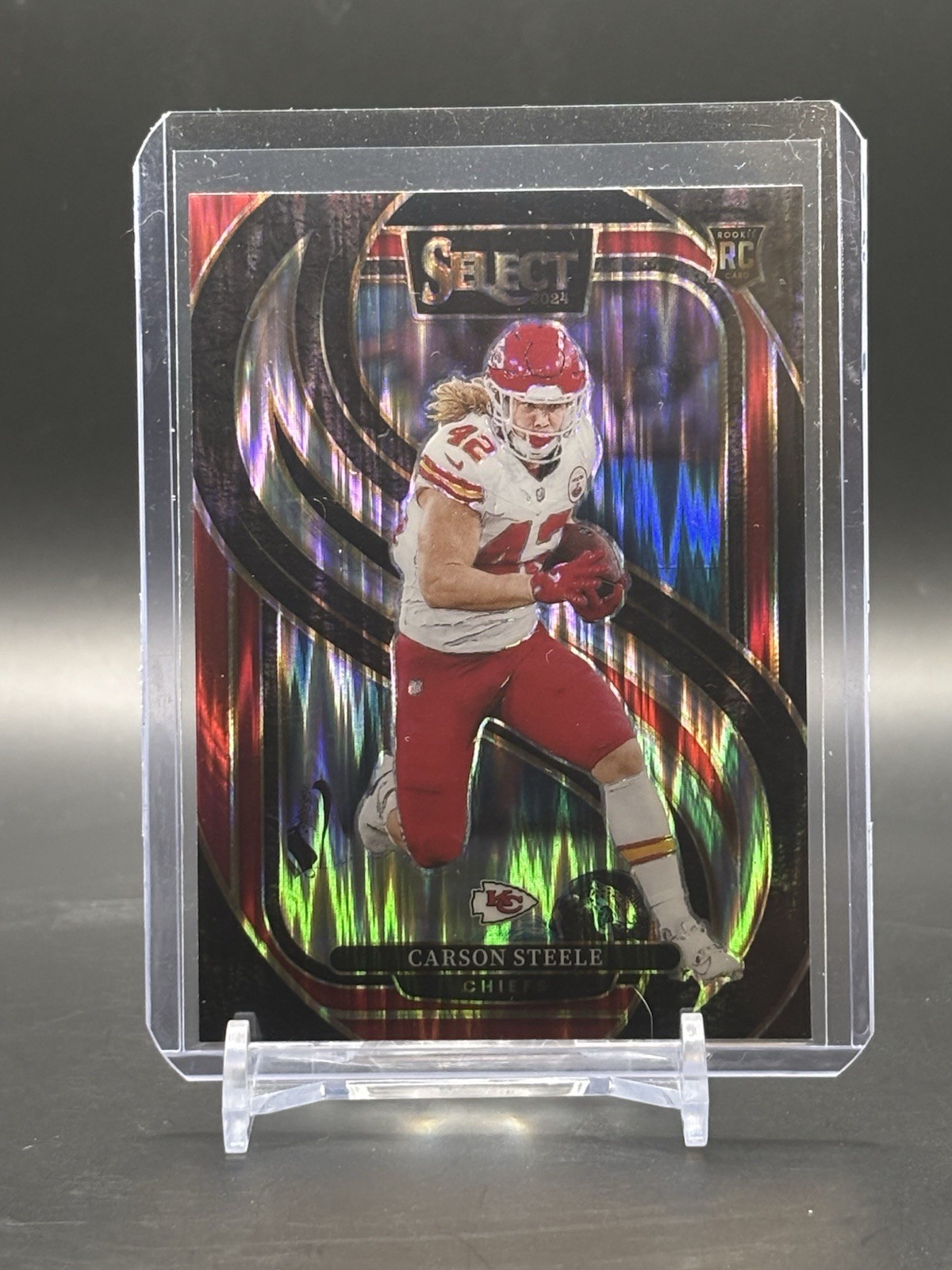 2024 Panini Select Premier Level Carson Steele #142 Black & Red Shock Prizm (RC)