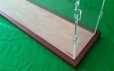 23.5"L x 8"W x 9"H display case with 3/16" thick acrylic brown wood frame base