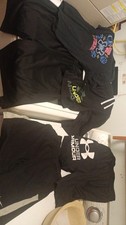 lot of 5 items clothing boys teen medium under armour and Nike 4 shorts 1 shirt