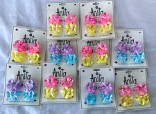 Lot 40..HAIR CLIPS..DIFFERENT COLORS..FLOWERS..NEW ON CARD  50 
