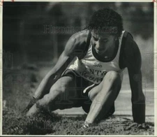 1987 Press Photo Central Square HS track athlete Mario Russo lands in sand pit
