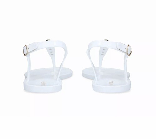 white studded jelly sandals