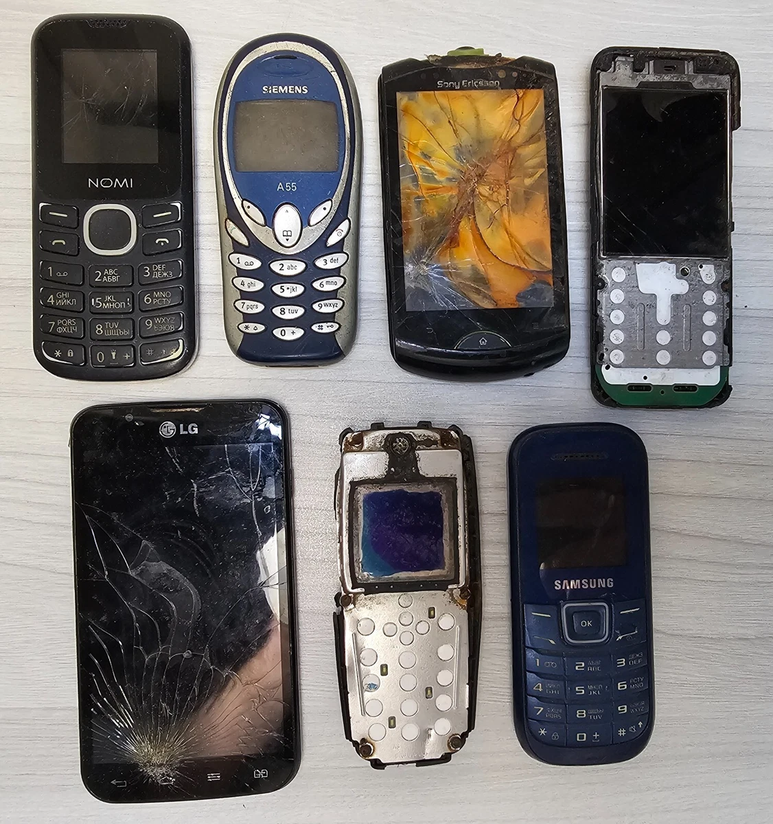 Lot of 7 Old Used Cell Mobile Phones FOR PARTS Nokia, Siemens, Samsung, LG, Sony